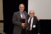 Dr. Nagib Callaos, General Chair, giving Prof. Russell Jay Hendel a plaque "In Appreciation for Delivering a Great Keynote Address at a Plenary Session."